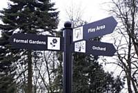 The directional Finger Pointer sign. The images on the signpost were designed by the students of Redwood Secondary School